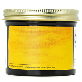 Bona Fide Pomade next to common items for scale showing compact 4 oz size portability