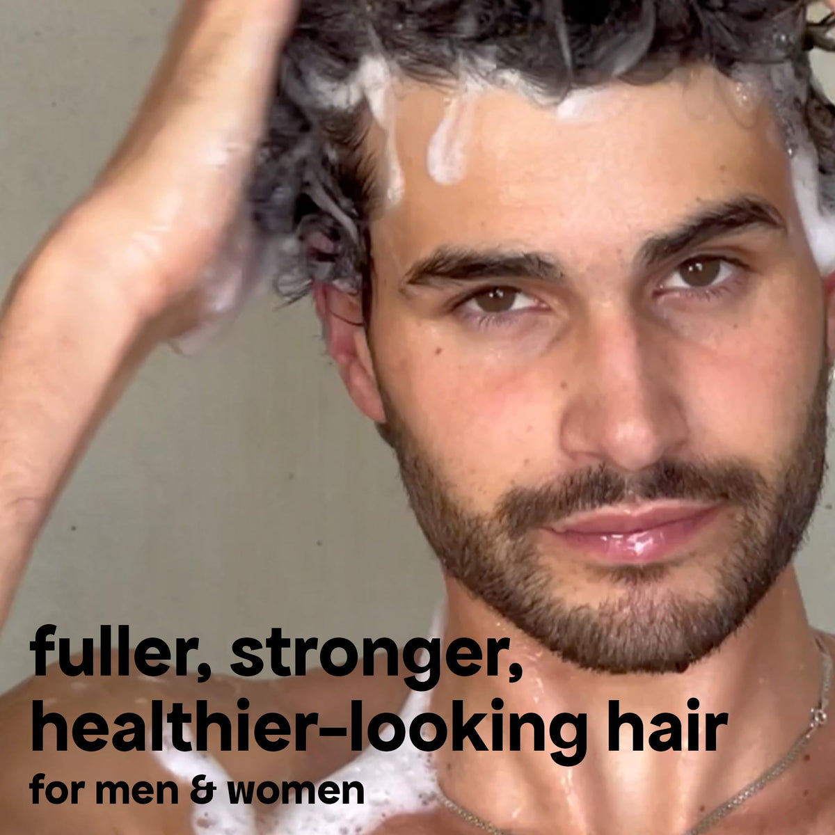 BondiBoost shampoo being massaged into scalp to support follicle care