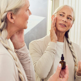 BOOM! by Cindy Joseph dropper dispensing clear golden oil for controlled application