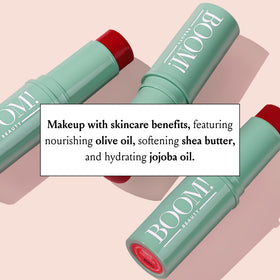 BOOM! by Cindy Joseph next to common items showing compact size and purse-friendly benefit