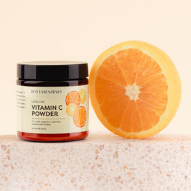 Bos Essentials label detail emphasizing non-GMO cosmetic-grade ingredient information