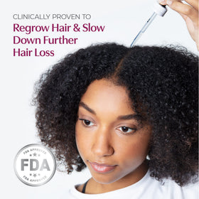 BosleyMD solution drop close-up showing texture and easy absorption for scalp
