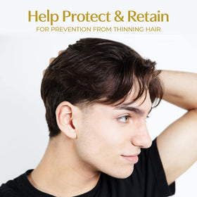 BosleyMD volumizing conditioner texture close-up showing lightweight cream for added body