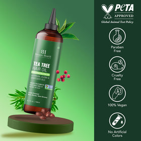 Botanic Hearth bottle with jojoba coconut grapeseed flatlay showing natural ingredients