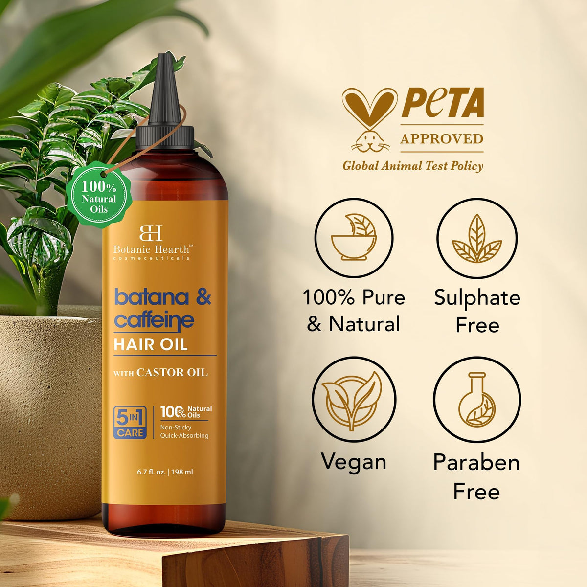 Botanic Hearth applying oil to scalp for targeted nourishment