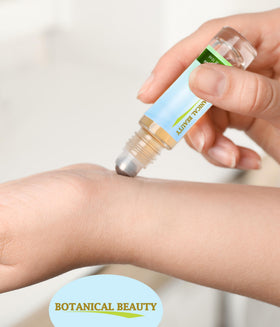 Botanical Beauty oil droplet on skin showing jojoba texture and moisturizing effect