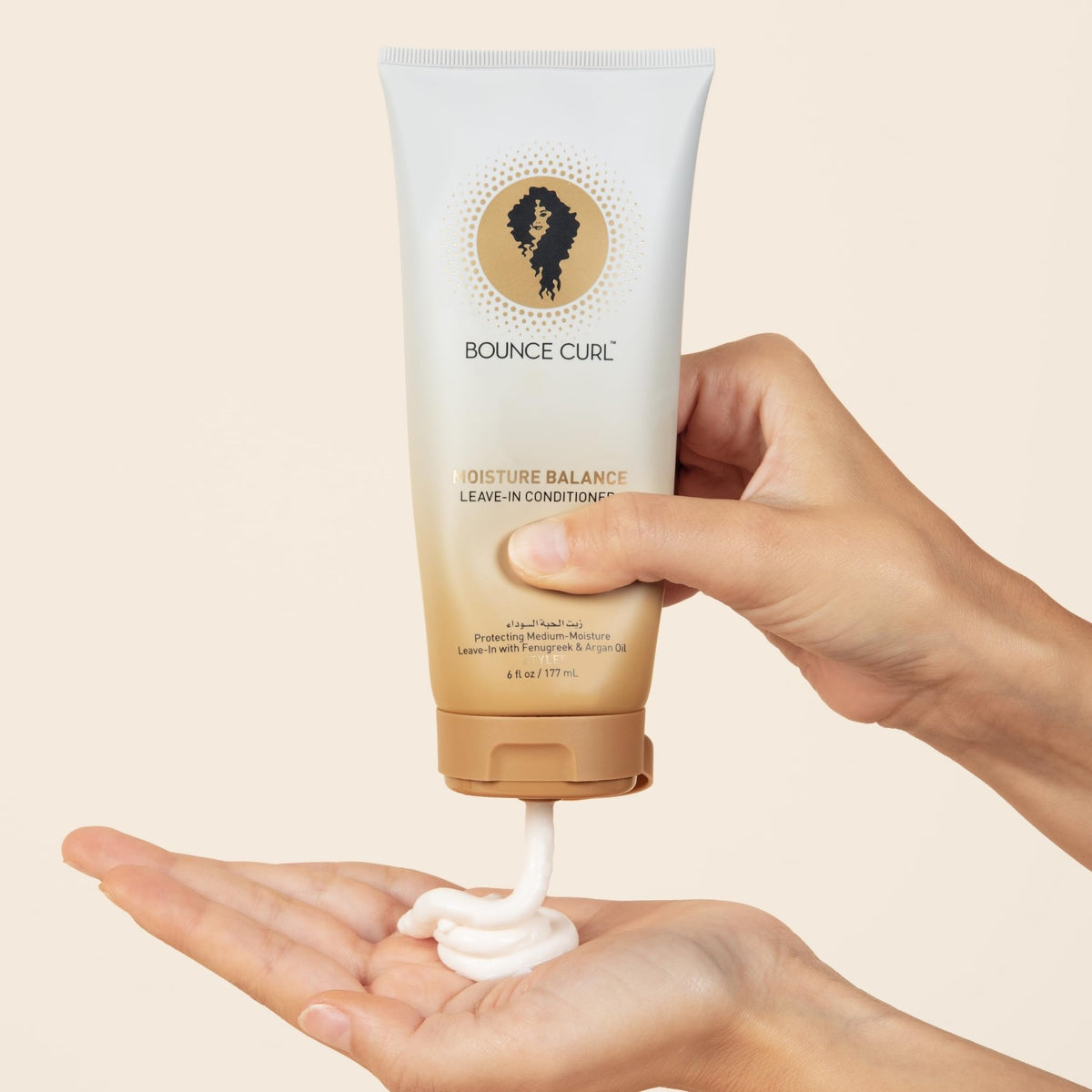 Bounce Curl being applied to curly hair improving manageability