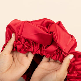Bounce Curl bonnet worn while sleeping to protect curls and reduce frizz