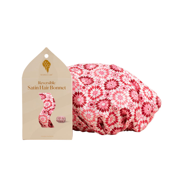 Bounce Curl front view of pink bonnet showing fit and protection