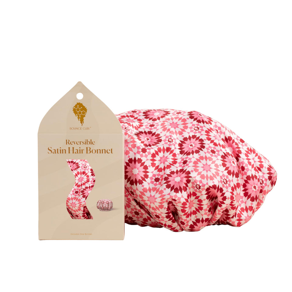 Bounce Curl front view of pink bonnet showing fit and protection