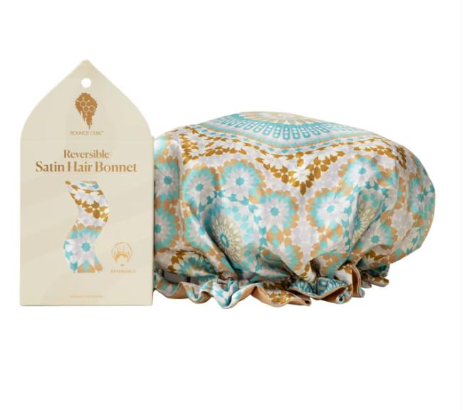 Bounce Curl teal bonnet front view showing fabric and secure fit for protected curls
