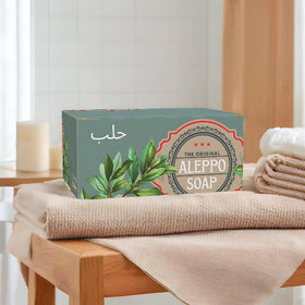 BOX 4 BODY bars styled on bathroom shelf conveying traditional craftsmanship and everyday use benefit