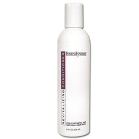 Brandywine scale and contents with bottles and 3-row brush demonstrating travel-friendly sizes