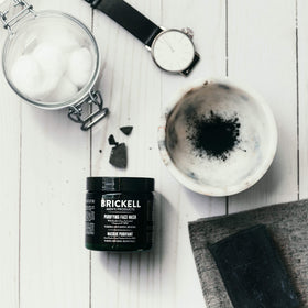 Brickell applying face mask demonstrating easy, even coverage benefit