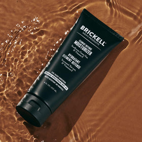 Brickell applying cream to face demonstrating easy absorption and protection