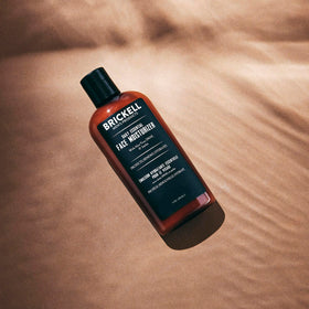 Brickell Men's Products application on jawline demonstrating non-greasy absorption and smooth feel