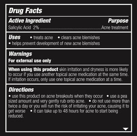 Brickell product applied to a blemish demonstrating targeted reduction and calming effect