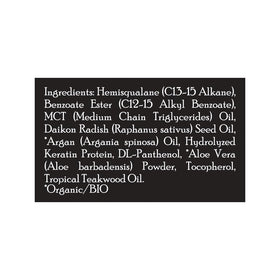 Brickell Men’s argan oil next to everyday items showing compact 2-ounce size