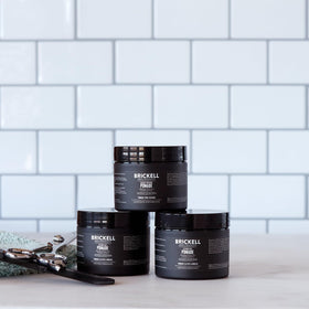 Brickell clay pomade ingredient panel with argan oil and hydrolyzed protein benefits listed
