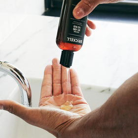 Brickell face wash in use by man for clean refreshed skin