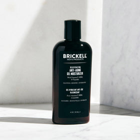 Brickell Men's product in use with man applying gel for smoother hydrated skin