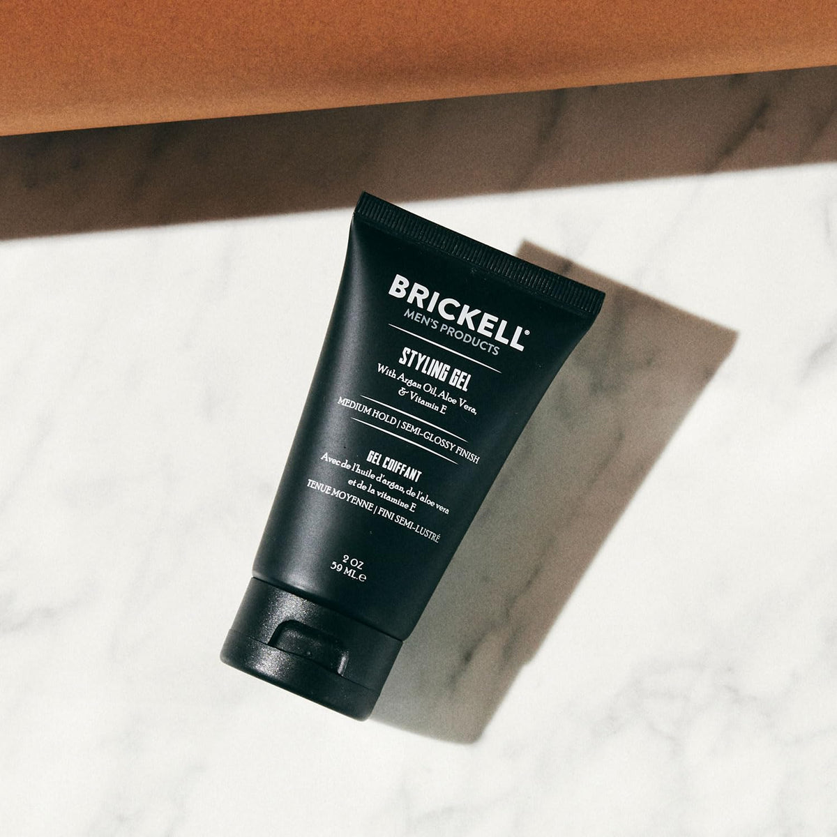 Brickell Men’s Hair Styling Gel texture in open jar, highlights smooth, non-flaky finish