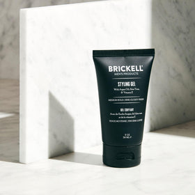 Brickell Men’s Hair Styling Gel on palm being applied, demonstrates easy, even distribution