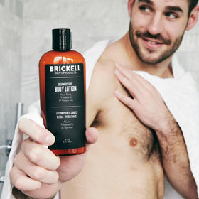 Brickell Men's Products lotion poured on hand demonstrating quick spreadability and hydration benefit