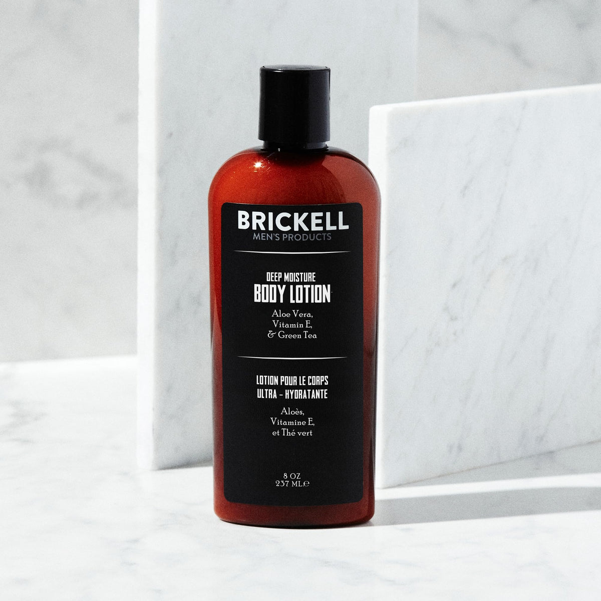 Brickell Men's Products close-up pump and lotion texture showing smooth fast-absorbing consistency