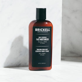 Brickell moisturizer lotion dispensed on hand highlighting lightweight hydration