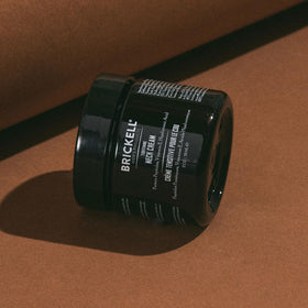 Brickell Men's Products on bathroom counter during morning routine for grooming confidence