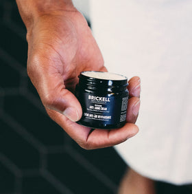 Brickell Men’s night cream open jar showing rich texture for overnight hydration and skin comfort