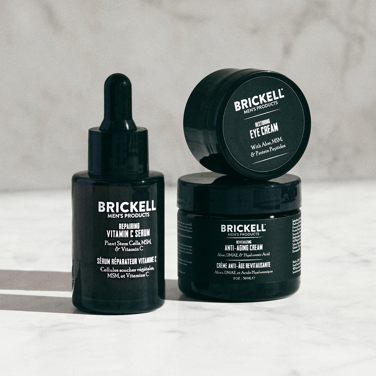 Brickell night face cream jar open showing creamy texture for overnight moisture benefit