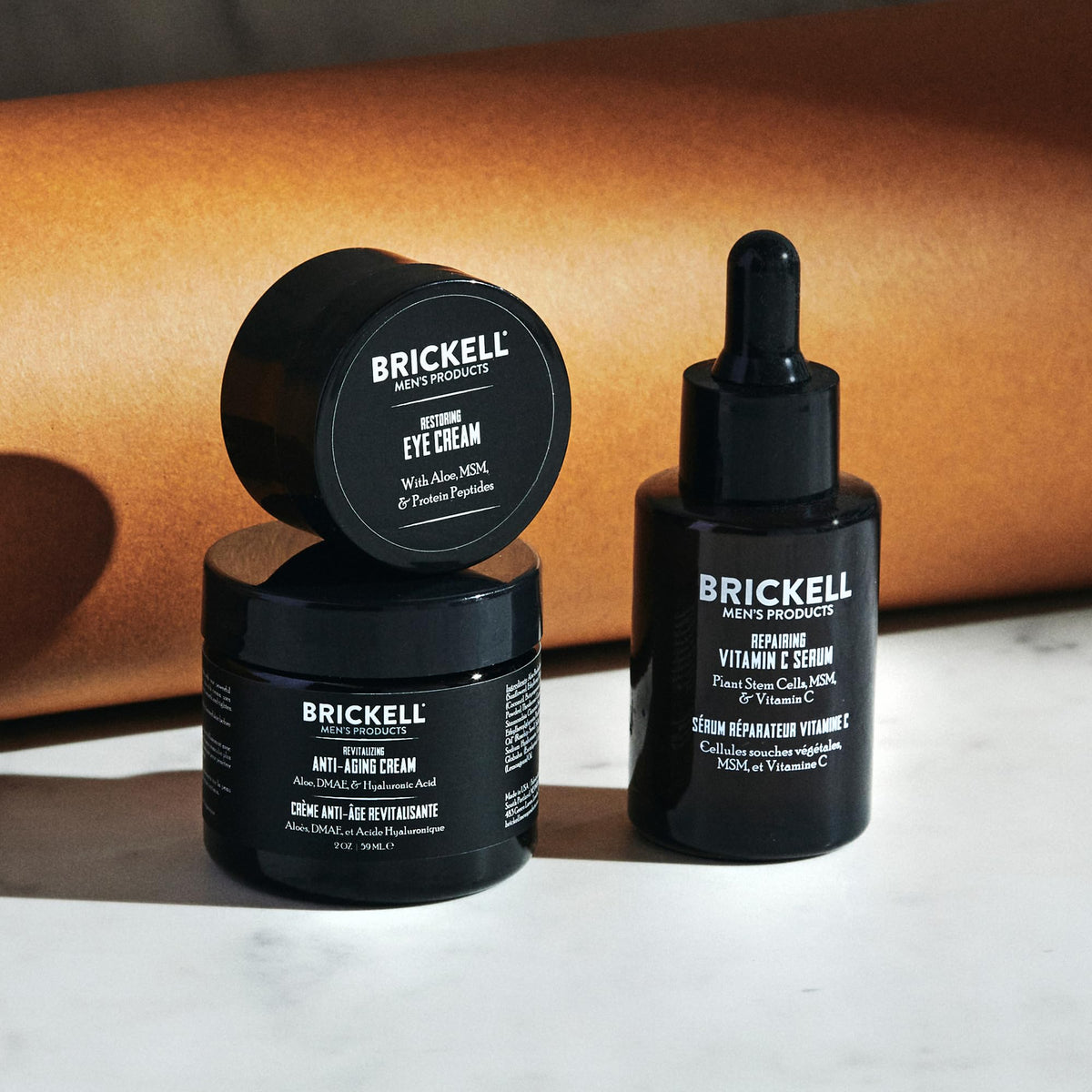 Brickell serum dropper releasing clear serum highlighting fast-absorbing hydration benefit