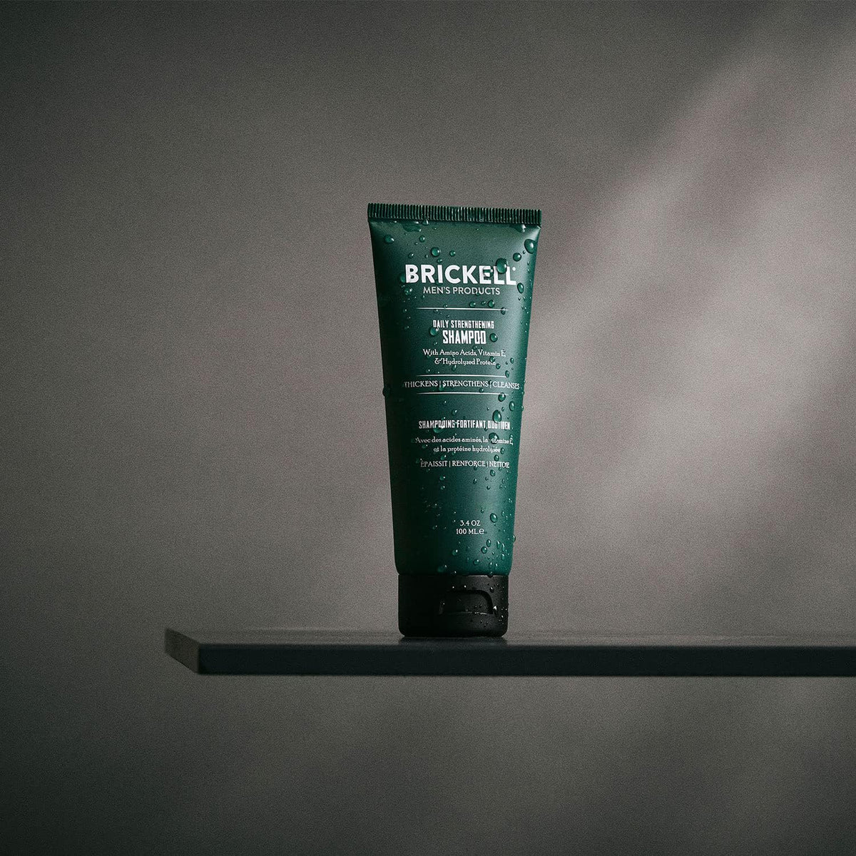 Brickell Men's Products shampoo in shower scene showing refreshing use