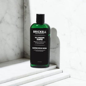 Brickell shampoo close-up texture on hand highlighting creamy, non-stripping lather