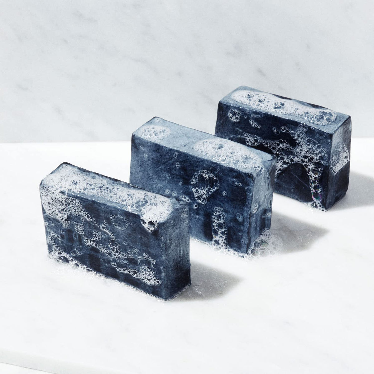 Brickell soap texture close-up with activated charcoal showing exfoliating benefit