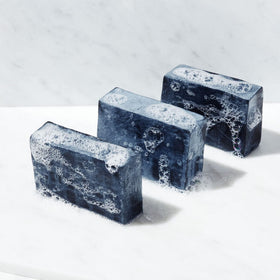Brickell soap texture close-up with activated charcoal showing exfoliating benefit