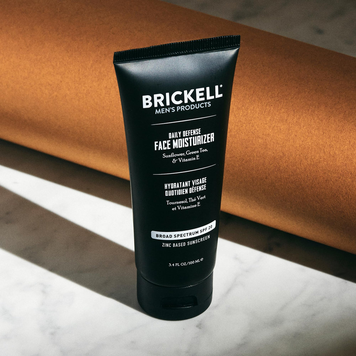 Brickell Men's Products texture spread on skin showing lightweight, fast-absorbing finish
