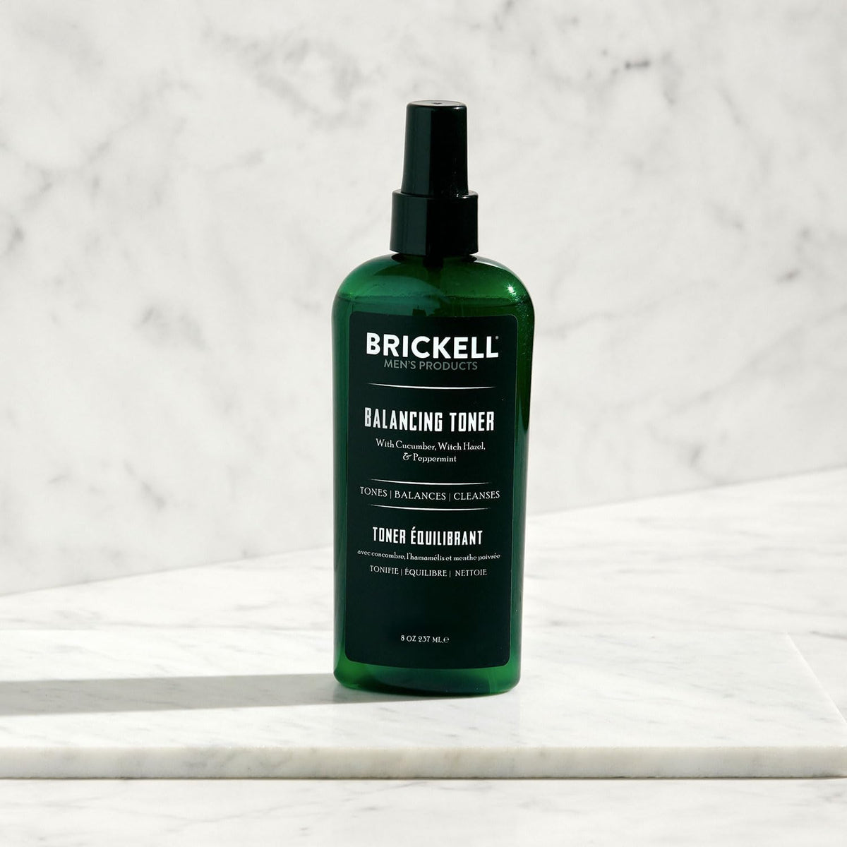 Brickell toner in use with splash demonstrating refreshing mint sensation and oil control