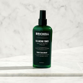 Brickell toner in use with splash demonstrating refreshing mint sensation and oil control