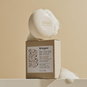 Briogeo bar beside sustainable packaging emphasizing plastic-free environmental benefit