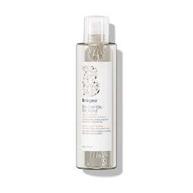 Briogeo front packaging showing shampoo bottle and clear product benefits