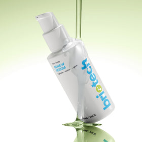BRIOTECH applying serum to face to soothe redness and refine skin