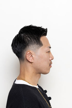 BROSH pomade on hand demonstrating easy application and non-sticky finish