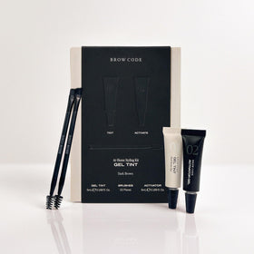 Brow Code front packaging showing Dark Brown kit benefits and instant activation