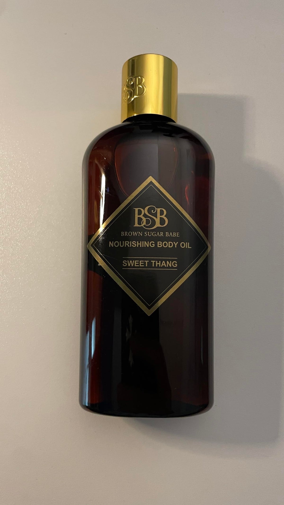 Brown Sugar Babe carrier oils display emphasizing natural ingredients and moisturization