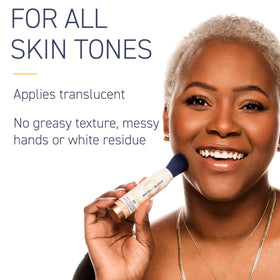 Brush On Block application over makeup showing quick touch-up benefit
