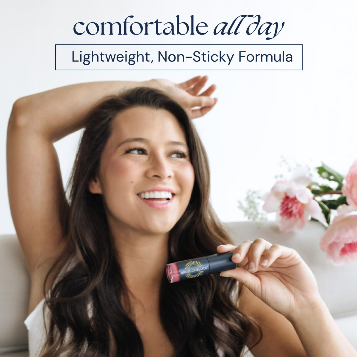 Brush On Block brush applying powder to face for quick makeup-friendly reapplication
