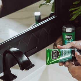BRUT shown on neck after shaving illustrating calming post-shave comfort
